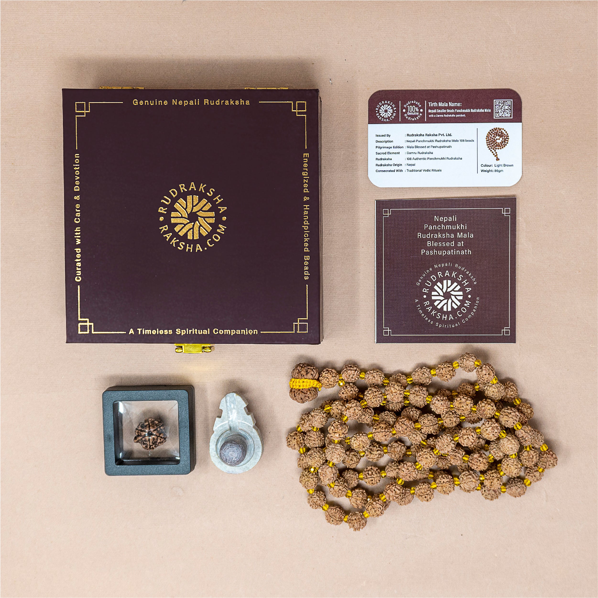Nepali Rudraksha Mala box with items