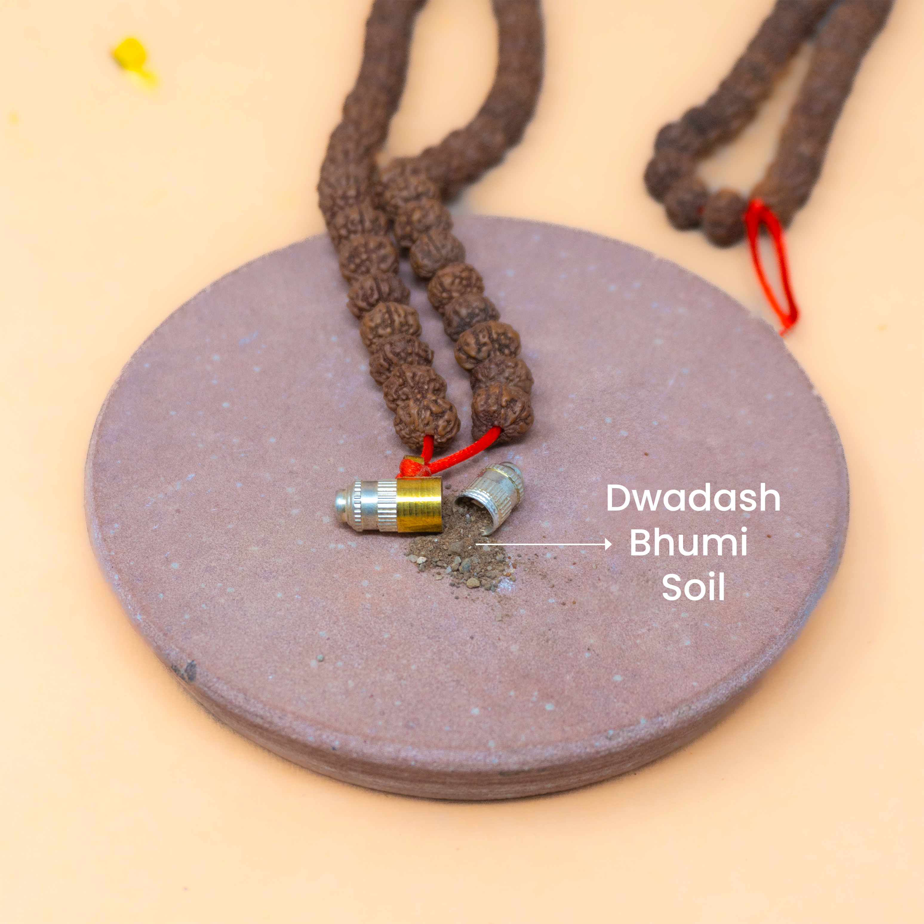 Dwadash Bhumi Mala soil in amulet