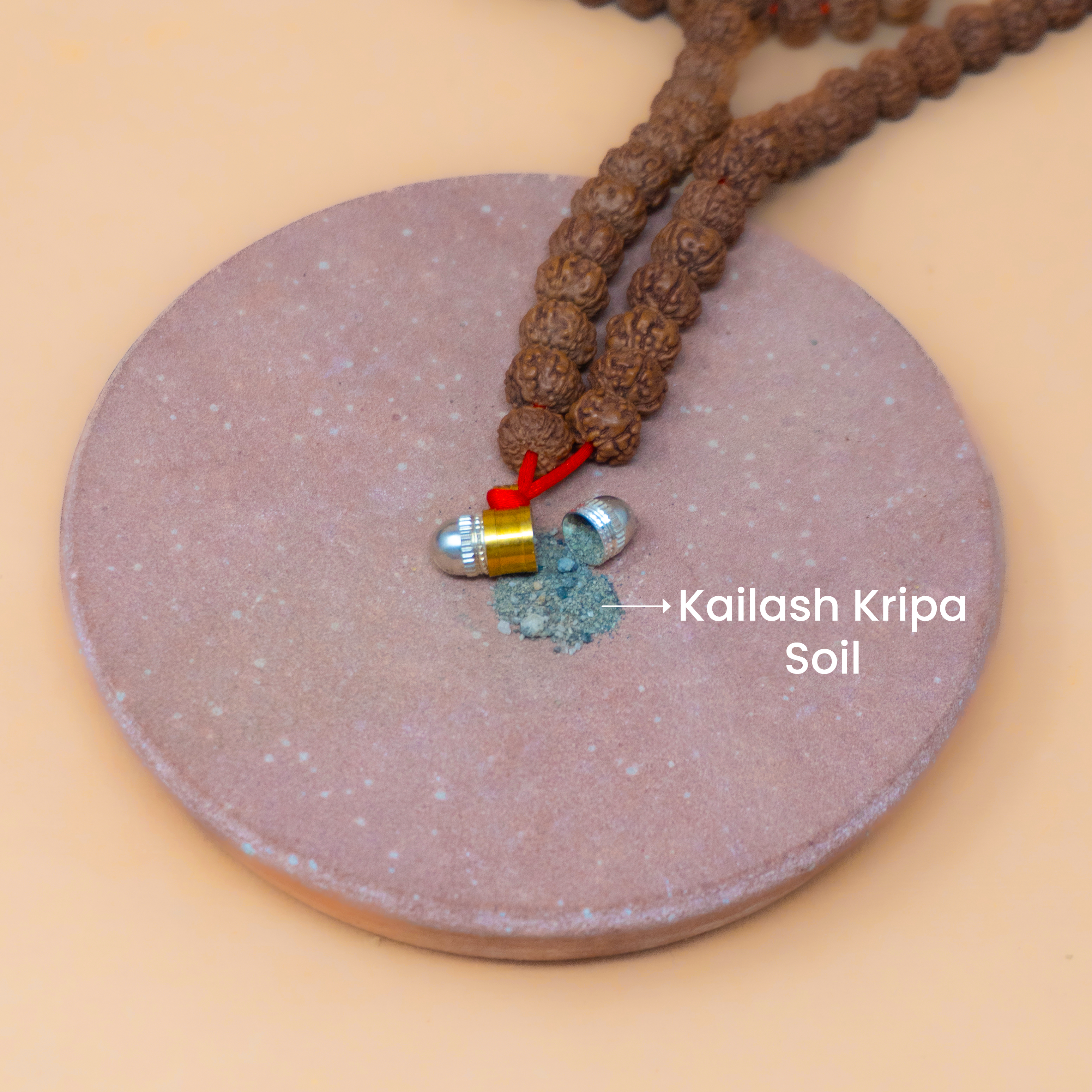 Mount Kailash soil in the amulet of Kailash Kripa Panchmukhi Rudraksha Mala